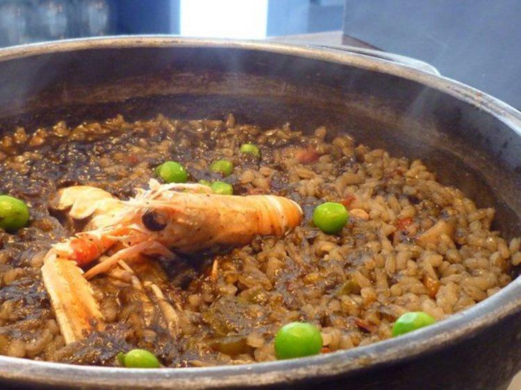 Enjoy beachside paella at La Mar Salada